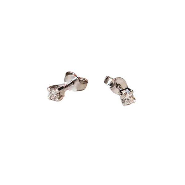Orecchini Punto Luce in oro bianco 18 Kt con diamanti ct. 0,23 .